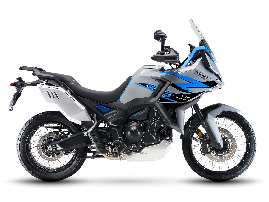 Zontes motos en Uruguay - Moto Zontes 703F con diseño adventure, asiento corrido y detalles azules. Zontes motos en Uruguay - Zontes 703F gris, blanco y azul de perfil con parabrisas alto, ruedas de rayos y carrocería adventure.